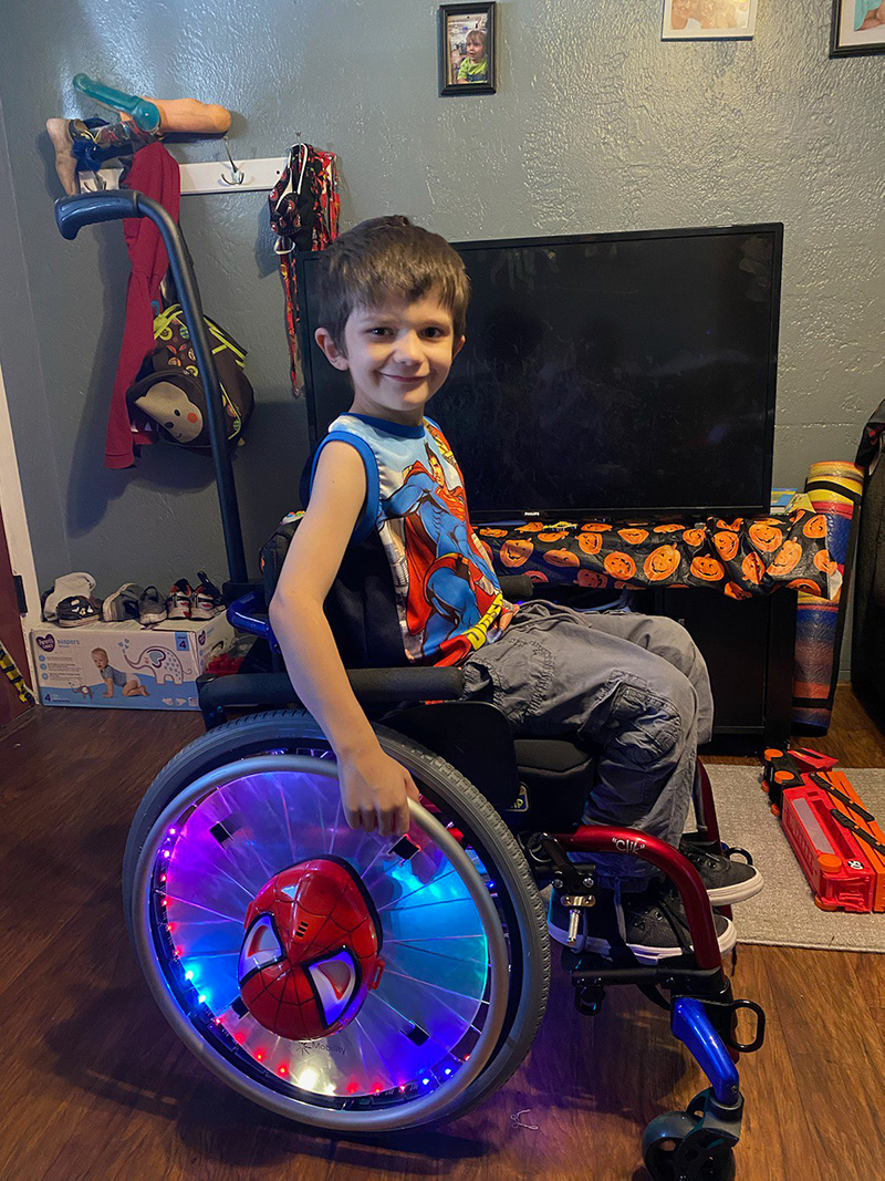 Tyler with his Spiderman wheels